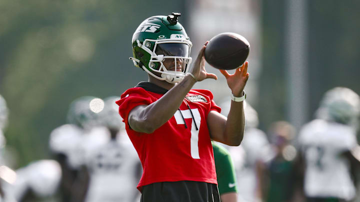 Jul 25, 2025; Florham Park, NJ, USA; New York Jets quarterback Justin Fields (7) catches a ball during a drill at training camp at Atlantic Health Jets Training Center. Mandatory Credit: John Jones-Imagn Images