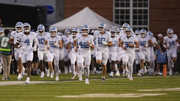 Sep 6, 2025; Charlotte, North Carolina, USA; North Carolina Tar Heels take the field during the first half against the Charlotte 49ers at Jerry Richardson Stadium. Mandatory Credit: Jim Dedmon-Imagn Images