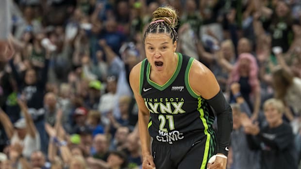 A photo of Kayla McBride celebratin