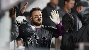 May 24, 2025; New York City, New York, USA;  New York Mets catcher Luis Torrens (13) celebrates in the dugout with his teammates after scoring in the fourth inning against the Los Angeles Dodgers at Citi Field. Mandatory Credit: Wendell Cruz-Imagn Images