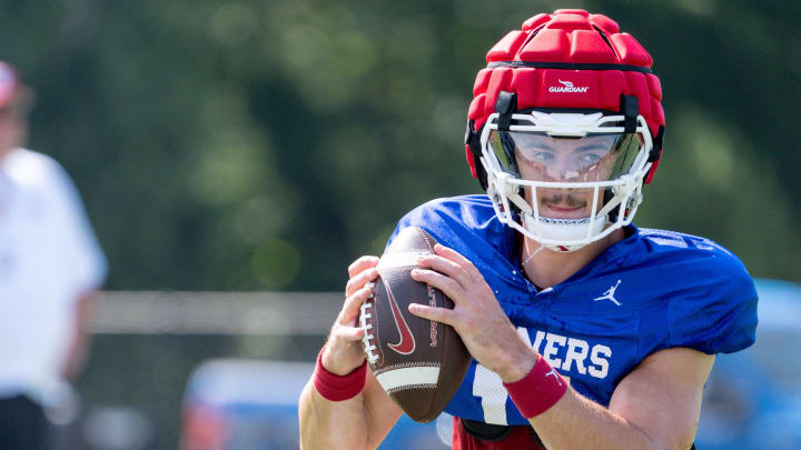 Jackson Arnold (11) runs drills during an Oklahoma football practice in Norman, Okla., on Tuesday, Aug. 13, 2024.