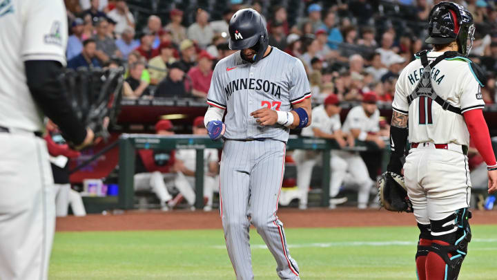 Minnesota Twins third base Royce Lewis (23) scores in the second inning against the Arizona Diamondbacks at Chase Field in Phoenix on June 27, 2024.