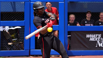 Texas Tech's NiJaree Canady (24) hits a fly ball during the 2025 Phillips 66 Big 12 Softball Championship game between Arizona Wildcats and Texas Tech Red Raiders at Devon Park in Oklahoma City, Saturday, May, 10, 2025.