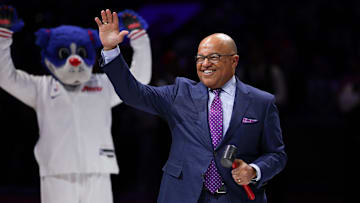 Sportscaster Mike Tirico waves to fans before a game between the Philadelphia 76ers and the Portland Trail Blazers at Wells Fargo Center. 