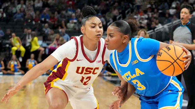 USC Trojans guard JuJu Watkins (12) guards UCLA Bruins guard Londynn Jones (3) during the first half of the 2025 TIAA Big Ten