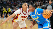 USC Trojans guard JuJu Watkins (12) guards UCLA Bruins guard Londynn Jones (3) during the first half of the 2025 TIAA Big Ten Women's Basketball Tournament final game on Sunday, March 9, 2025, at Gainbridge Fieldhouse in Indianapolis. UCLA defeated USC 72-67.