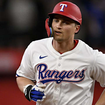 Jun 28, 2025; Arlington, Texas, USA; Texas Rangers shortstop Corey Seager (5) rounds the bases after he hits a two run home run against the Seattle Mariners during the third inning at Globe Life Field