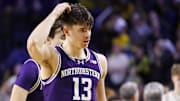 Jan 19, 2025; Ann Arbor, Michigan, USA;  Northwestern Wildcats guard Brooks Barnhizer (13) reacts after the game against the Michigan Wolverines at Crisler Center. Mandatory Credit: Rick Osentoski-Imagn Images
