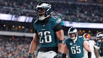 Jan 26, 2025; Philadelphia, PA, USA; Philadelphia Eagles running back Saquon Barkley (26) celebrates after a touchdown against the Washington Commanders during the second half in the NFC Championship game at Lincoln Financial Field. Mandatory Credit: Bill Streicher-Imagn Images