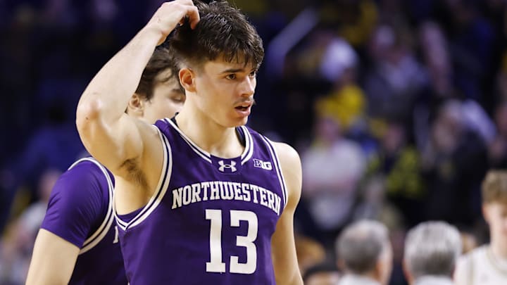 Jan 19, 2025; Ann Arbor, Michigan, USA; Northwestern Wildcats guard Brooks Barnhizer (13) reacts after the game against the Michigan Wolverines at Crisler Center. Mandatory Credit: Rick Osentoski-Imagn Images Jan 19, 2025; Ann Arbor, Michigan, USA; Northwestern Wildcats guard Brooks Barnhizer (13) reacts after the game against the Michigan Wolverines at Crisler Center. Mandatory Credit: Rick Osentoski-Imagn Images
