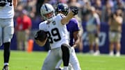 Sep 15, 2024; Baltimore, Maryland, USA; Las Vegas Raiders tight end Brock Bowers (89) reacts after a play during the first half against the Baltimore Ravens at M&T Bank Stadium. Mandatory Credit: Reggie Hildred-Imagn Images