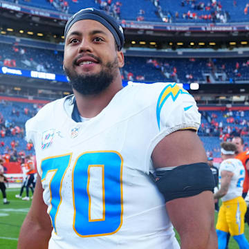 Oct 13, 2024; Denver, Colorado, USA; Los Angeles Chargers offensive tackle Rashawn Slater (70) following the win over the Denver Broncos at Empower Field at Mile High. Mandatory Credit: Ron Chenoy-Imagn Images