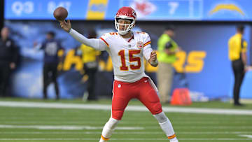 Sep 29, 2024; Inglewood, California, USA;  Kansas City Chiefs quarterback Patrick Mahomes (15) scrambles in the pocket as he throws a pass in the second half against the Los Angeles Chargers at SoFi Stadium. Mandatory Credit: Jayne Kamin-Oncea-Imagn Images