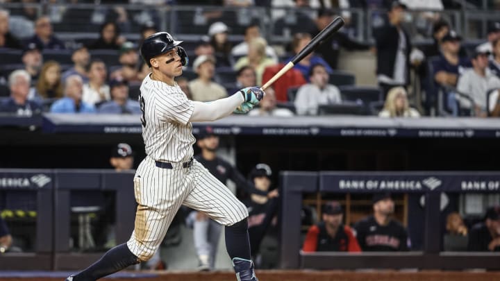 Aug 21, 2024; Bronx, New York, USA;  New York Yankees center fielder Aaron Judge (99) hits a solo home run in the seventh inning against the Cleveland Guardians at Yankee Stadium. Mandatory Credit: Wendell Cruz-USA TODAY Sports