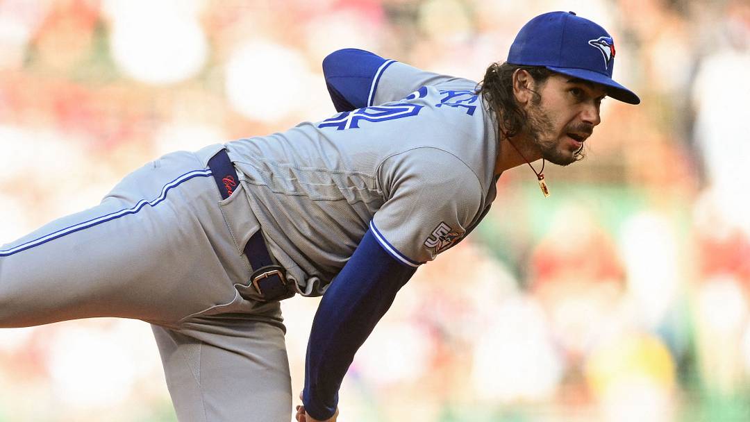 Toronto Blue Jays pitcher Dylan Cease (84) pitches on the road. 