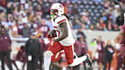 Nov 1, 2025; Blacksburg, Virginia, USA;  Louisville Cardinals running back Keyjuan Brown (22)  runs the ball for a touchdown against the Virginia Tech Hokies during the fourth quarter at Lane Stadium. Mandatory Credit: Brian Bishop-Imagn Images