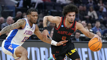 Mar 27, 2025; San Francisco, CA, USA; Maryland Terrapins guard Ja'Kobi Gillespie (0) drives to the hoop past Florida Gators guard Alijah Martin (15) during the first half during a West Regional semifinal of the 2025 NCAA tournament at Chase Center. Mandatory Credit: Kyle Terada-Imagn Images