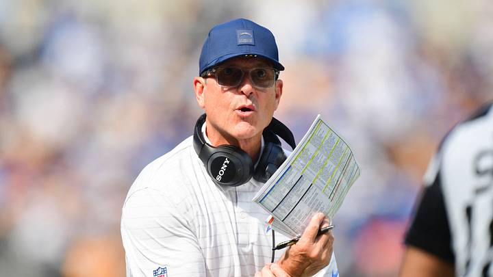 Oct 19, 2025; Inglewood, California, USA; Los Angeles Chargers head coach Jim Harbaugh reacts in the first half against the Indianapolis Colts at SoFi Stadium. Mandatory Credit: Gary A. Vasquez-Imagn Images