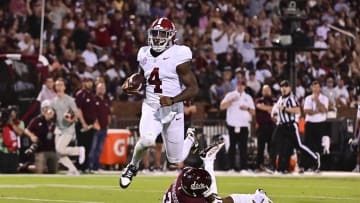 Sep 30, 2023; Starkville, Mississippi, USA; Alabama Crimson Tide quarterback Jalen Milroe (4) runs