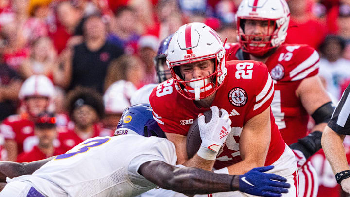 Sep 14, 2024; Lincoln, Nebraska, USA; Nebraska Cornhuskers wide receiver Carter Nelson (29) runs after a catch against Northern Iowa Panthers defensive back JJ Dervil (3) during the first quarter at Memorial Stadium.