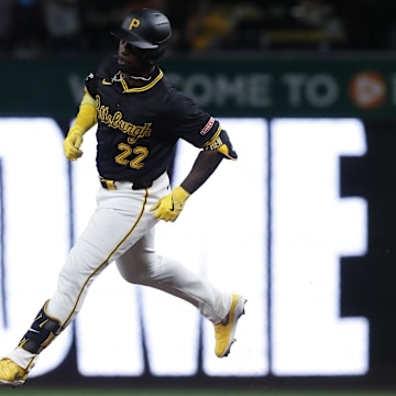 Pittsburgh Pirates designated hitter Andrew McCutchen (22) circles the bases on a three-run home run against the Miami Marlins during the fifth inning at PNC Park. 