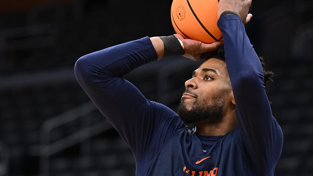 Mar 27, 2024; Boston, MA, USA; Illinois Fighting Illini forward Quincy Guerrier (13) takes a shot during a practice day before the semifinals of the East Regional in the 2024 NCAA Tournament at the TD Garden. Mandatory Credit: Brian Fluharty-Imagn Images