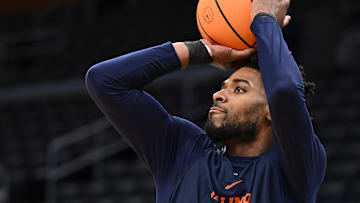 Mar 27, 2024; Boston, MA, USA; Illinois Fighting Illini forward Quincy Guerrier (13) takes a shot during a practice day before the semifinals of the East Regional in the 2024 NCAA Tournament at the TD Garden. Mandatory Credit: Brian Fluharty-Imagn Images