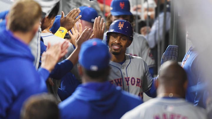 Oct 5, 2024; Philadelphia, PA, USA; New York Mets shortstop Francisco Lindor (12) celebrates after scoring a run in the eighth inning against the Philadelphia Phillies in game one of the NLDS for the 2024 MLB Playoffs at Citizens Bank Park. Mandatory Credit: Eric Hartline-Imagn Images