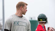 Jan 10, 2015; Euless, TX, USA; Oregon Ducks offensive coordinator Scott Frost watches his team during practice at the Euless Trinity High School football field. Mandatory Credit: Jerome Miron-Imagn Images