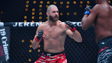 Jan 18, 2025; Inglewood, California, USA; Jiri Prochazka (red gloves) fights Jamahal Hill (blue gloves) during UFC 311 at Intuit Dome. Mandatory Credit: Gary A. Vasquez-Imagn Images