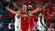 Feb 4, 2025; Oxford, Mississippi, USA; Mississippi Rebels guard Sean Pedulla (3) and forward Mikeal Brown-Jones (1) react during the first half against the Kentucky Wildcats at The Sandy and John Black Pavilion at Ole Miss. Mandatory Credit: Petre Thomas-Imagn Images