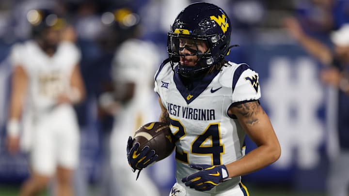 Oct 3, 2025; Provo, Utah, USA; West Virginia Mountaineers wide receiver Rodney Gallagher III (24) warms up before the game against the Brigham Young Cougars at LaVell Edwards Stadium. Mandatory Credit: Rob Gray-Imagn Images Oct 3, 2025; Provo, Utah, USA; West Virginia Mountaineers wide receiver Rodney Gallagher III (24) warms up before the game against the Brigham Young Cougars at LaVell Edwards Stadium. Mandatory Credit: Rob Gray-Imagn Images