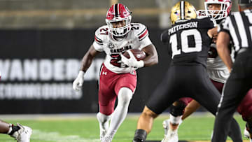 Nov 9, 2024; Nashville, Tennessee, USA;  South Carolina Gamecocks running back Oscar Adaway III (27) runs the ball against the Vanderbilt Commodores during the second half at FirstBank Stadium. Mandatory Credit: Steve Roberts-Imagn Images