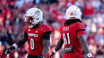 Louisville Cardinals wide receiver Chris Bell Jr. (0) celebrates with Cataurus Hicks (81) on his play during their game against the Jacksonville State Gamecocks on Saturday, Sept. 7, 2024 at L&N Federal Credit Union Stadium in Louisville, Ky.