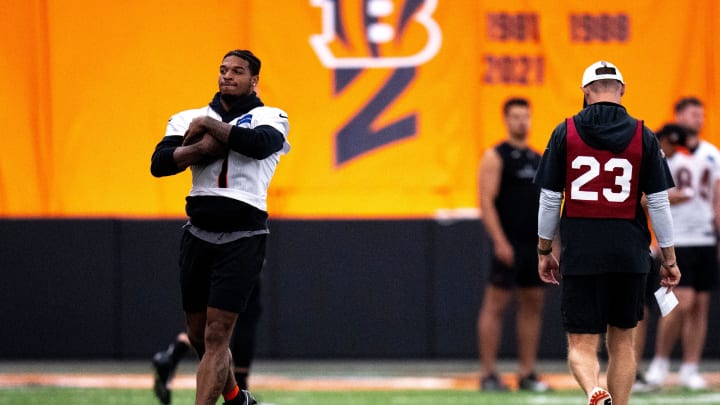 Cincinnati Bengals wide receiver Ja'Marr Chase (1) runs with the ball at Bengals spring practice at the IEL Indoor Facility in Cincinnati on Tuesday, June 11, 2024.