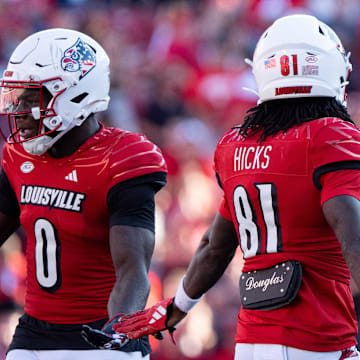 Louisville Cardinals wide receiver Chris Bell Jr. (0) celebrates with Cataurus Hicks (81) on his play during their game against the Jacksonville State Gamecocks on Saturday, Sept. 7, 2024 at L&N Federal Credit Union Stadium in Louisville, Ky.