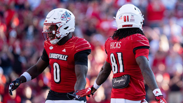 Louisville Cardinals wide receiver Chris Bell Jr. (0) celebrates with Cataurus Hicks (81) on his play during their game against the Jacksonville State Gamecocks on Saturday, Sept. 7, 2024 at L&N Federal Credit Union Stadium in Louisville, Ky.