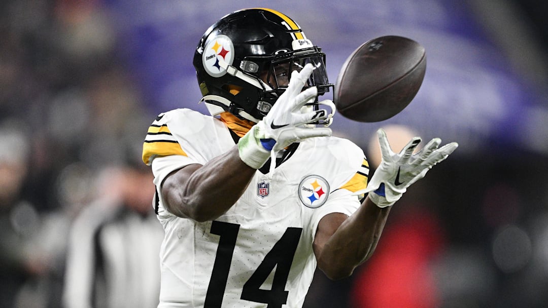 Jan 11, 2025; Baltimore, Maryland, USA; Pittsburgh Steelers wide receiver George Pickens (14) makes a catch against the Baltimore Ravens in the third quarter in an AFC wild card game at M&T Bank Stadium. Mandatory Credit: Tommy Gilligan-Imagn Images