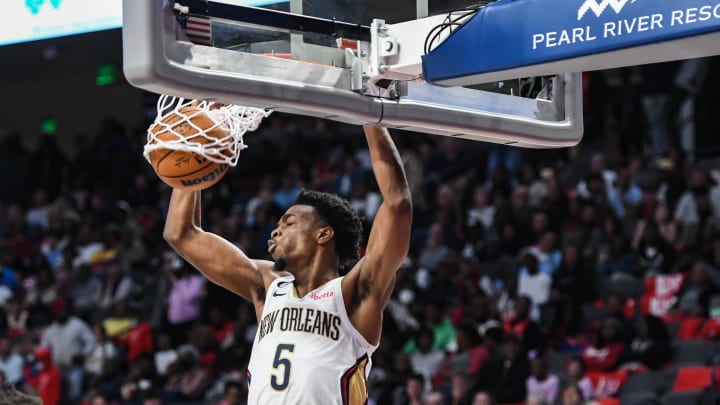 Oct 14, 2022; Birmingham, Alabama, USA; New Orleans Pelicans guard Herb Jones (5) dunks the ball against the Atlanta Hawks in the second quarter at Legacy Arena at BJCC.