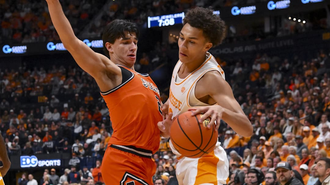 Dec 6, 2025; Nashville, Tennessee, USA; Illinois Fighting Illini guard Andrej Stojakovic (2) bumps Tennessee Volunteers forward Nate Ament (10) during the first half at Bridgestone Arena. Dec 6, 2025; Nashville, Tennessee, USA; Illinois Fighting Illini guard Andrej Stojakovic (2) bumps Tennessee Volunteers forward Nate Ament (10) during the first half at Bridgestone Arena.