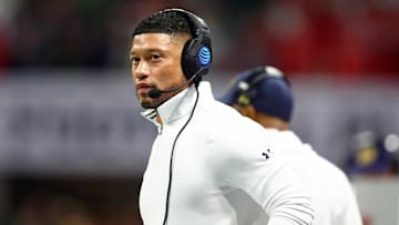 Jan 20, 2025; Atlanta, GA, USA; Notre Dame Fighting Irish head coach Marcus Freeman looks on against the Ohio State Buckeyes during the first half the CFP National Championship college football game at Mercedes-Benz Stadium. Mandatory Credit: Mark J. Rebilas-Imagn Images