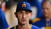 Seattle Mariners pitcher George Kirby is pictured in the dugout during a game against the Texas Rangers on July 31 at T-Mobile Park.