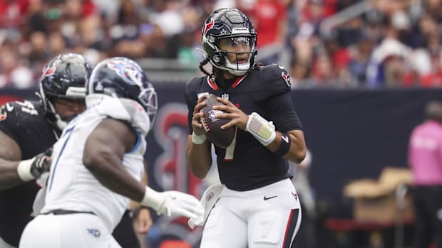 Sep 28, 2025; Houston, Texas, USA; Houston Texans quarterback CJ. Stroud (7) looks for an open receiver during the fourth qua
