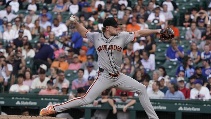 Jun 18, 2024; Chicago, Illinois, USA; San Francisco Giants pitcher Logan Webb (62) throws the ball against the Chicago Cubs during the first inning at Wrigley Field.