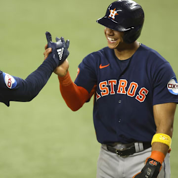 Sep 5, 2023; Arlington, Texas, USA; Houston Astros designated hitter Yordan Alvarez (44) and shortstop Jeremy Pena (3) celebrate a two-run home run in the seventh inning against the Texas Rangers  at Globe Life Field. 