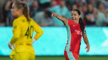 Jul 20, 2024; Kansas City, Missouri, USA; Kansas City Current midfielder Lo'eau LaBonta (10) reacts after a play during the second half against the Houston Dash at CPKC Stadium. Mandatory Credit: Jay Biggerstaff-USA TODAY Sports