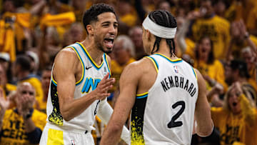 Apr 29, 2025; Indianapolis, Indiana, USA; Indiana Pacers guard Andrew Nembhard (2) celebrates a made basket with  guard Tyrese Haliburton (0) during game five of the first round for the 2024 NBA Playoffs against the Milwaukee Bucks  at Gainbridge Fieldhouse. Mandatory Credit: Trevor Ruszkowski-Imagn Images