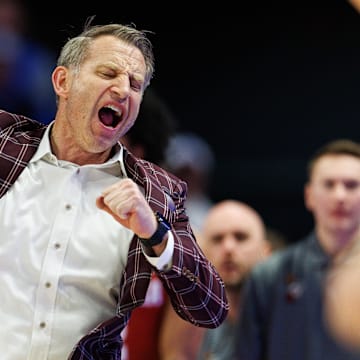Jan 18, 2025; Lexington, Kentucky, USA; Alabama Crimson Tide head coach Nate Oats celebrates during the second half against the Kentucky Wildcats at Rupp Arena at Central Bank Center. Mandatory Credit: Jordan Prather-Imagn Images