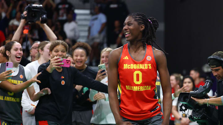 Mar 30, 2026; Goodyear, AZ, USA; Oliviyah Edwards celebrates after dunking the ball during the McDonalds All American Jam Fest at Millennium High School. Mandatory Credit: Mark J. Rebilas-Imagn Images