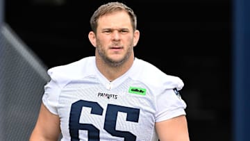 Jun 9, 2025; Foxborough, MA, USA; New England Patriots center Garrett Bradbury (65) walks to the practice fields at Gillette Stadium. Mandatory Credit: Eric Canha-Imagn Images